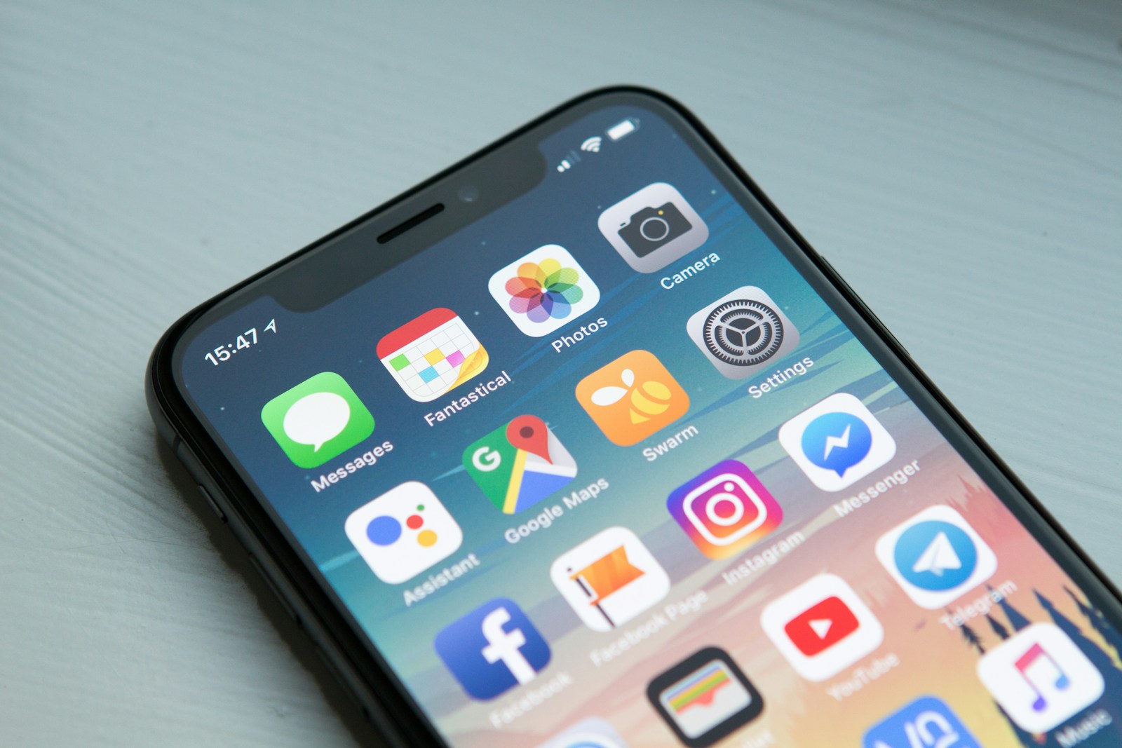 Smartphone displaying a grid of app icons.